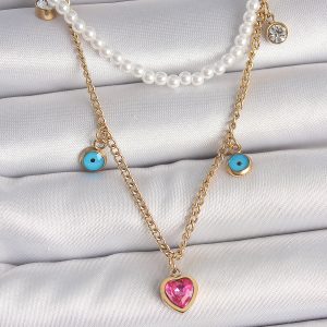 316L Çelik Gold Renk 2'Li İnci Zincir Model Pembe Taşlı Kalp Figür Nazar Boncuk Detay Kadın Kolye