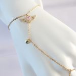 316L Çelik Gold Renk Pembe Zirkon Taşlı Kanatlı Kalp Model Şahmeran