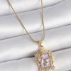 316L Çelik Gold Renk Zincir Mor Mineli Çiçek İşlemeli Zirkon Taşlı Kelebek Detay Portre Model Kadın Kolye