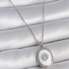 316L Çelik Gümüş Renk Beyaz Mineli Güneş İşlemeli Nazar Boncuk Detay Madalyon Model Kadın Kolye