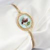 316L Çelik Zincir Turkuaz Mineli Sanatsal Portre İnci Detaylı Lale Model Gold Renk Kadın Bileklik