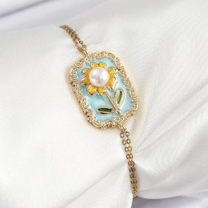 316L Çelik Zincir Turkuaz Mineli Sanatsal Portre İnci Detaylı Papatya Model Gold Renk Kadın Bileklik