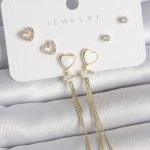 Pirinç Gold Renk Beyaz Mineli Sallantı Mineli Kalp Model Zirkon Taş Detaylı 925 Ayar Gümüş Çivi Kadın Küpe Seti