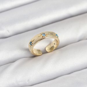 Pirinç Gold Renk Mavi Zirkon Taşlı Kutup Yıldızı Model Kadın Yüzük