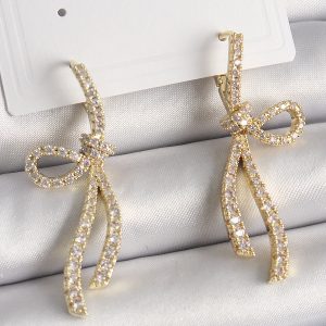 Pirinç Gold Renk Zirkon Taşlı Kurdele Model Kadın Küpe