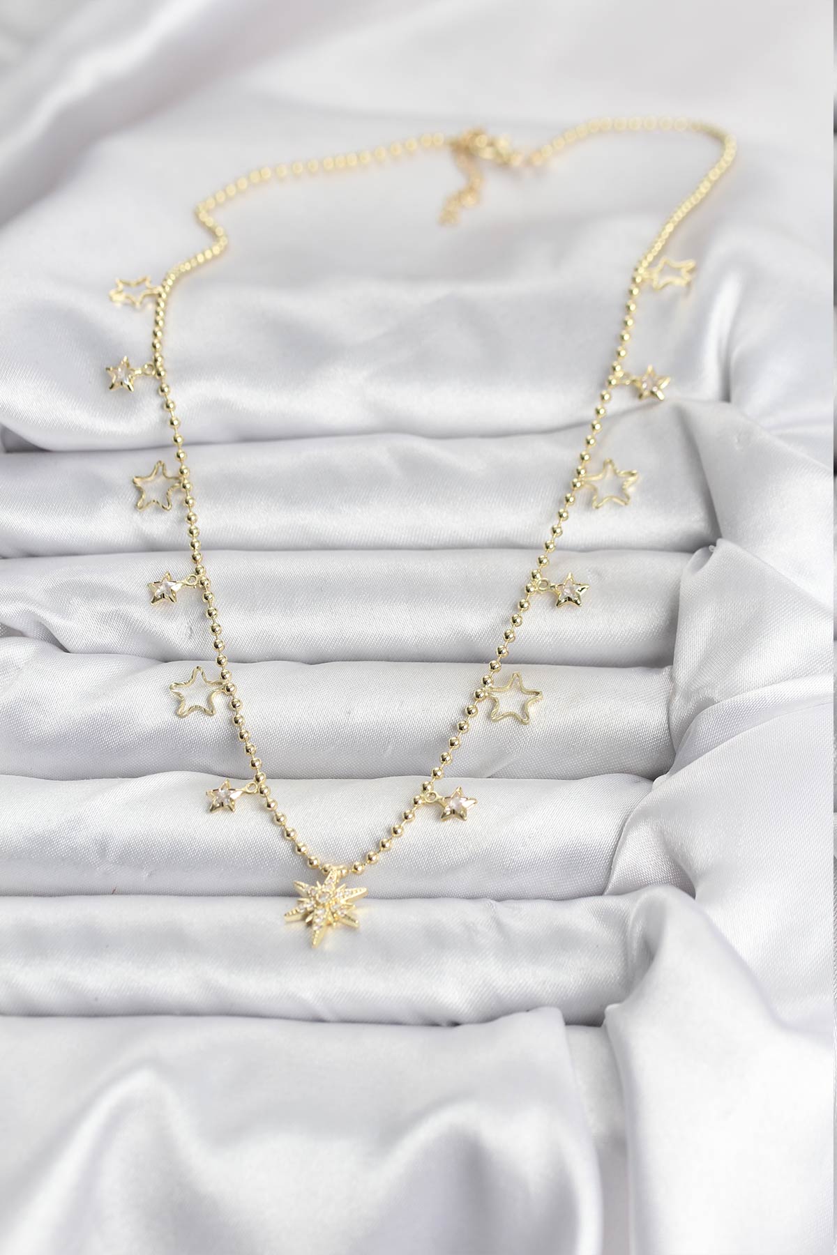 Pirinç Gold Renk Zirkon Taşlı Kutup Yıldızı Model Kadın Kolye