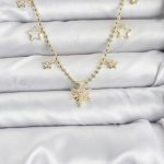 Pirinç Gold Renk Zirkon Taşlı Kutup Yıldızı Model Kadın Kolye