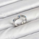 Pirinç Gümüş Renk Mavi Zirkon Taşlı Kutup Yıldızı Model Kadın Yüzük