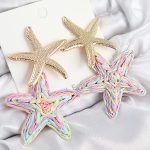 Pirinç Sallantılı Rainbow Deniz Yıldızı Model Gold Renk Hasır Küpe