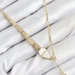 Pirinç Yılan Model Gold Renk Asansörlü Kadın Kolye