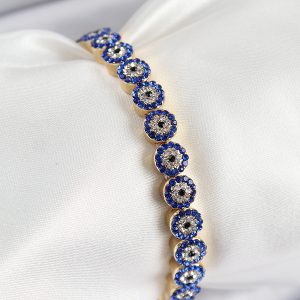 Pirinç Zirkon Taşlı Lacivert Nazar Model Gold Renk Lastikli Kadın Bileklik