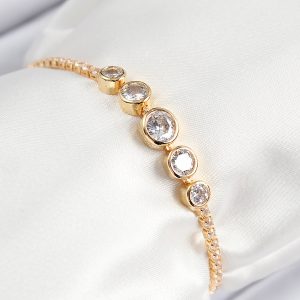 Pirinç Zirkon Taşlı Sıralı Daire Model Gold Renk Asansörlü Kadın Bileklik