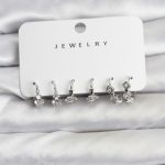 Gümüş Renk Pirinç Yıldız Modelli Kadın Küpe Seti