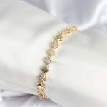 Pirinç Gold Renk Zirkon Taşlı Yonca Model Kadın Bileklik